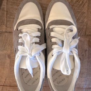 Prada women’s shoes-never worn outside the house.  Trendy-old school look.